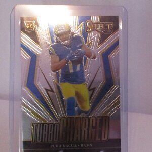 2023 Panini Select TURBOCHARGERED PUKA NACUA Los Angeles Rams Mag & Stand